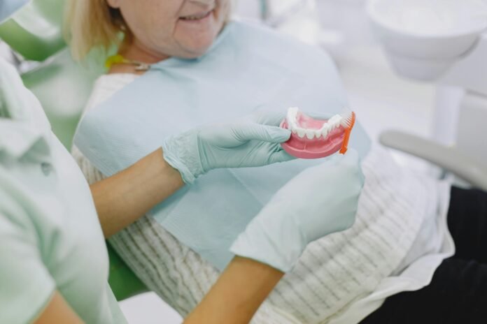 dentures, tooth replacement, denture care, how to clean dentures, when to replace dentures, denture materials, removable dentures, prosthodontist advice, denture maintenance, tooth extraction and dentures, denture lifespan, dental health for seniors